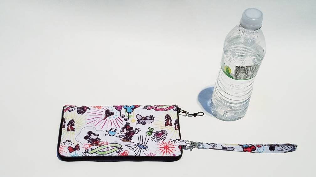 Quilted Disney Fabric Wristlet, Wallet, Cell Phone Case or Passport Purse made from Disney Fabric for all occasions the Amelia Bag